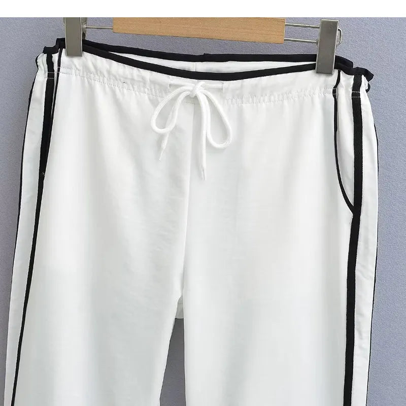 Low-waist loose straight-leg trousers with ribbon parallel bars detail in navy blue