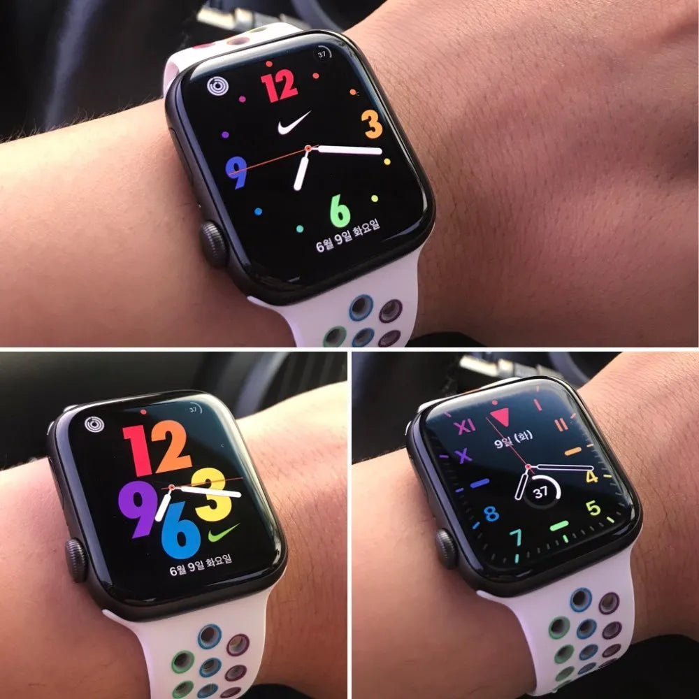 Black adjustable silicone sports wristband with a buckle closure shown on a wrist.