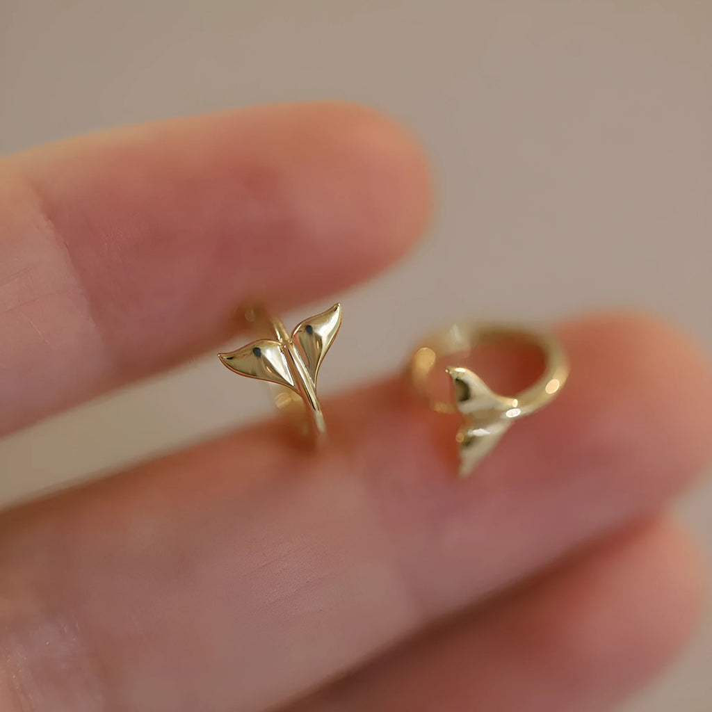 Pair of S925 sterling silver earrings with 14k gold plating featuring a smooth fishtail design and 8mm inner diameter