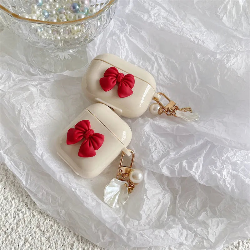 Beige red bow shell TPU protective case with clamshell closure for AirPods Pro wireless earphones
