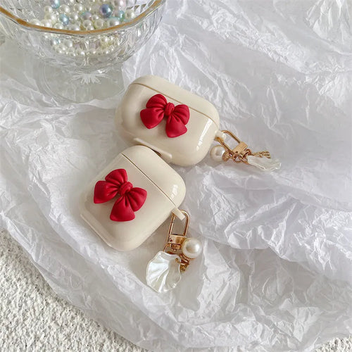 Beige red bow shell TPU protective case with clamshell closure for AirPods Pro wireless earphones