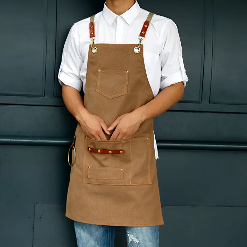Han style canvas apron with cross-back straps in solid camel colour for cafe baking work