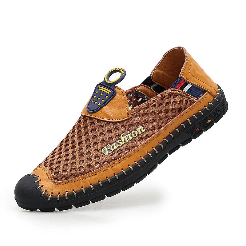 Men's brown casual mesh shoes with a round toe and stitched rubber sole on a plain background.