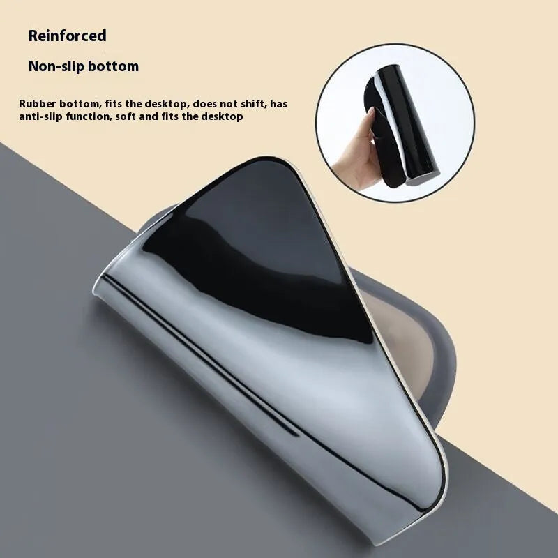 Ergonomic cloth-silicone mouse pad with raised wrist support on a desk