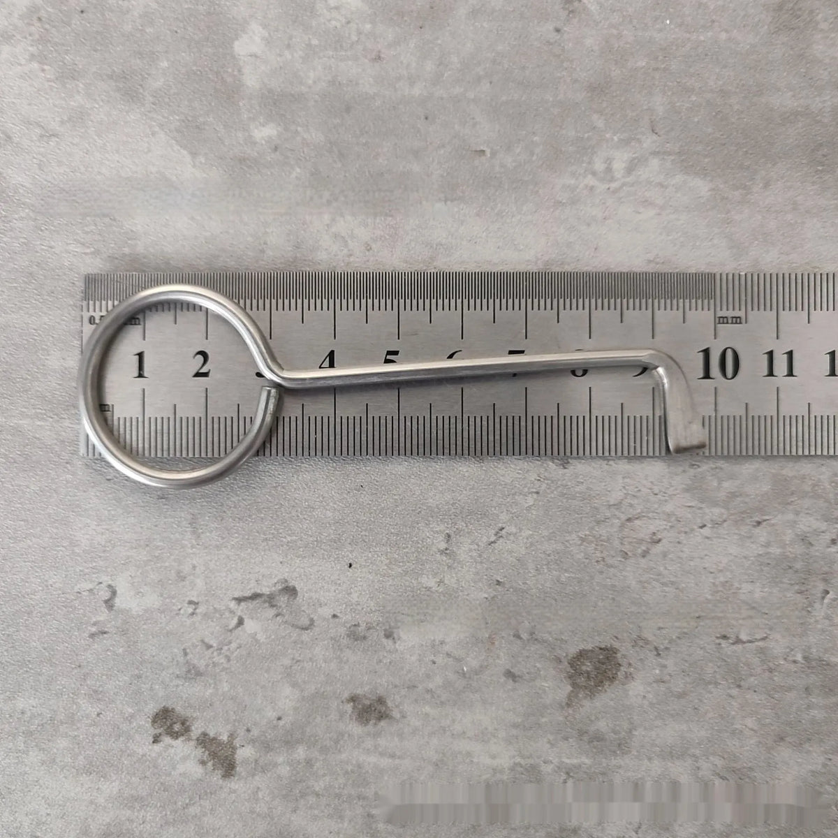 Two alloy wrench tools from a portable universal maintenance set.