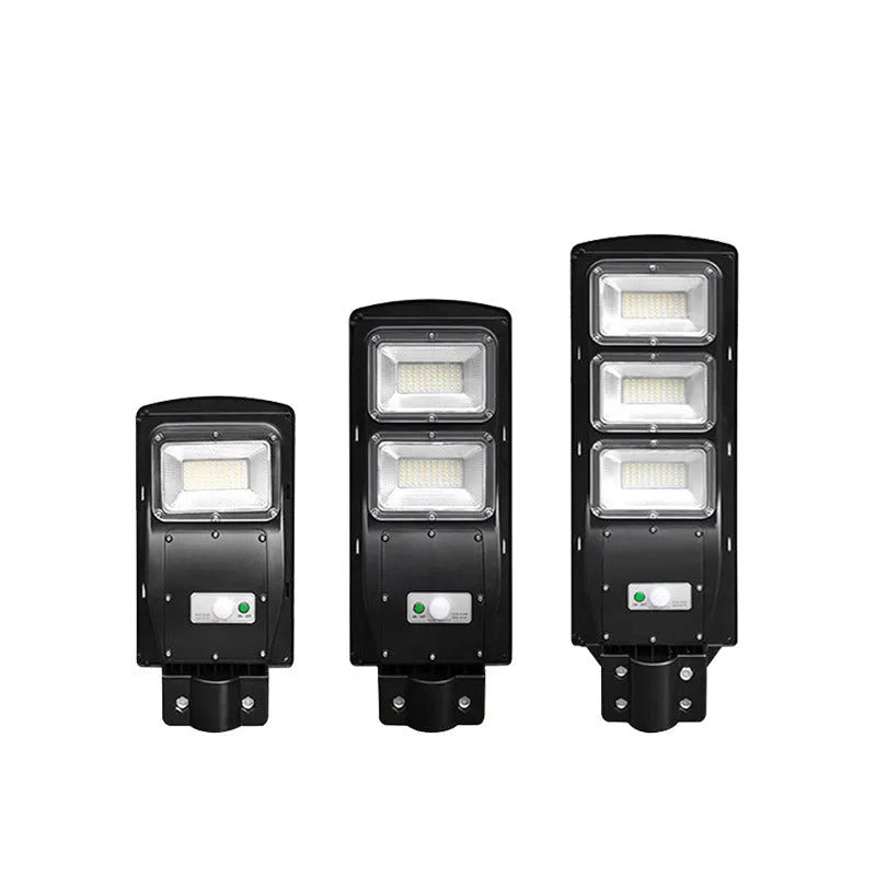 Integrated solar street light with solar panel and LED light in single housing unit for outdoor installation