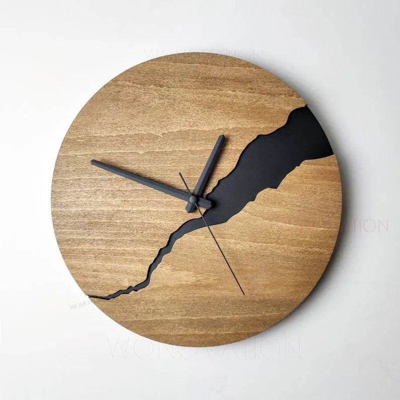 Modern wooden wall clock with creative crack design on a simple shell.