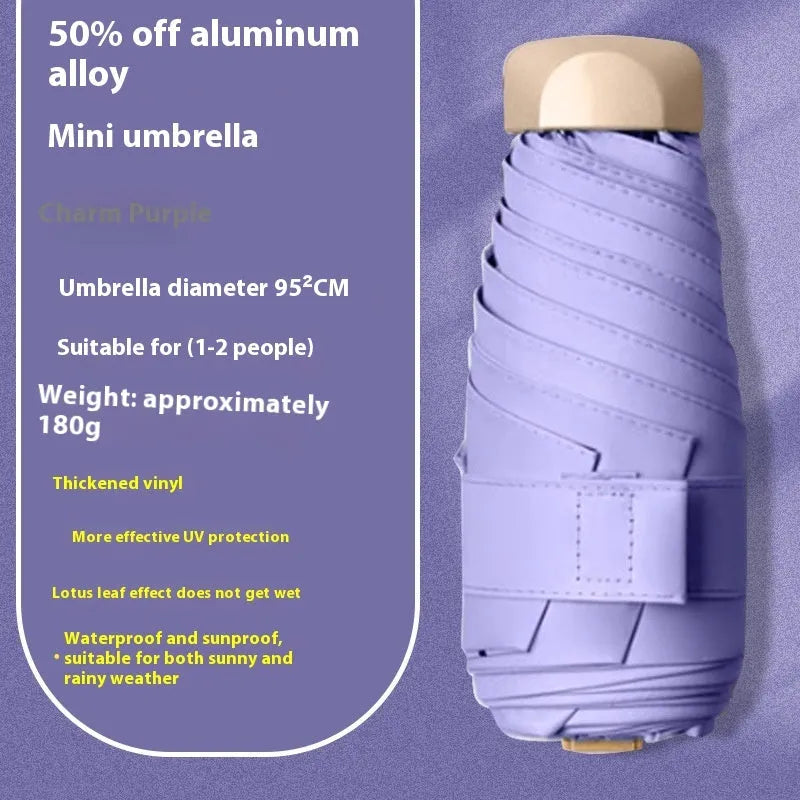 Closed five-fold manual umbrella with a gradient vinyl sunshade, showing the six-alloy-bone frame and one of eight colour options.