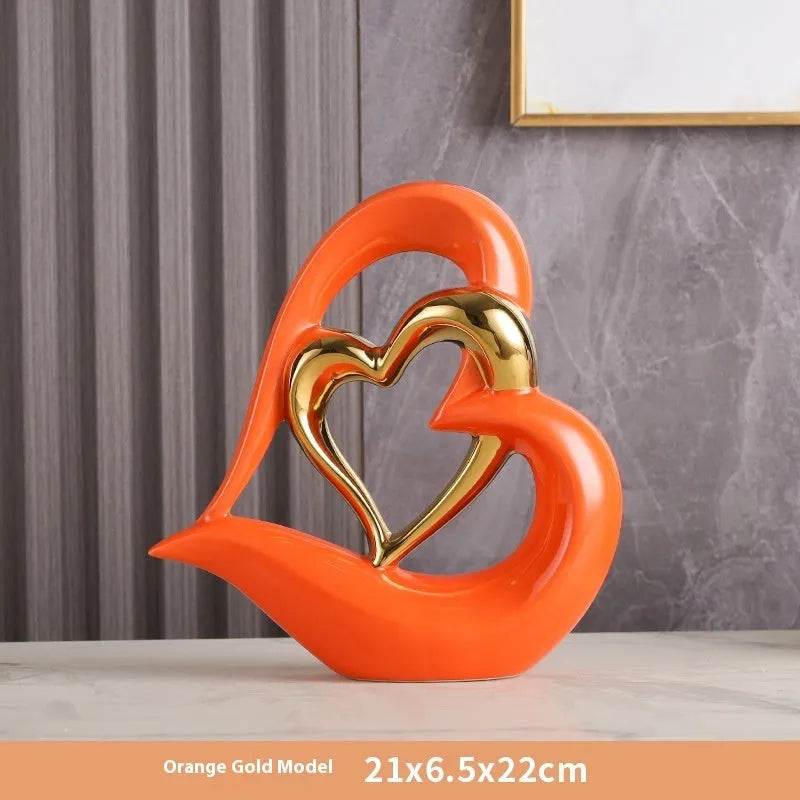 White porcelain heart ornament with geometric design in metallic colour finish