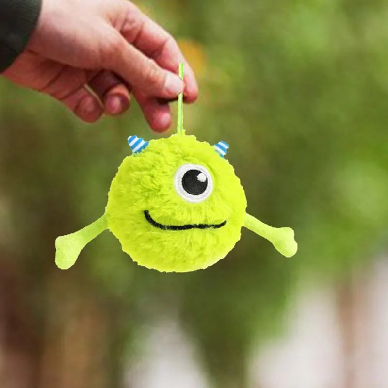 Green interactive dog ball toy with sound activation for teething puppies