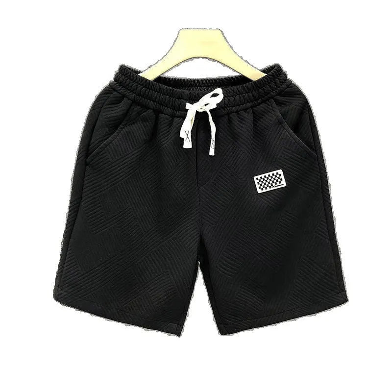 Micro-elastic polyester sports shorts in white, black and green colours for beach and casual wear