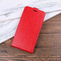 Honor 7X leather wallet phone case in black showing card slots and crazy horse pattern texture.