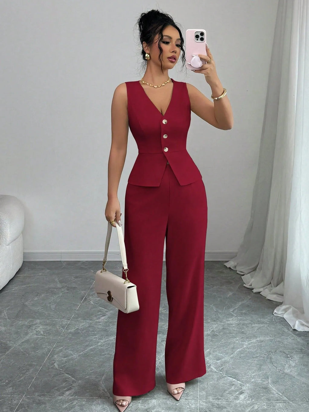 Women's solid colour sleeveless vest and high waist trousers two-piece set in a casual style.