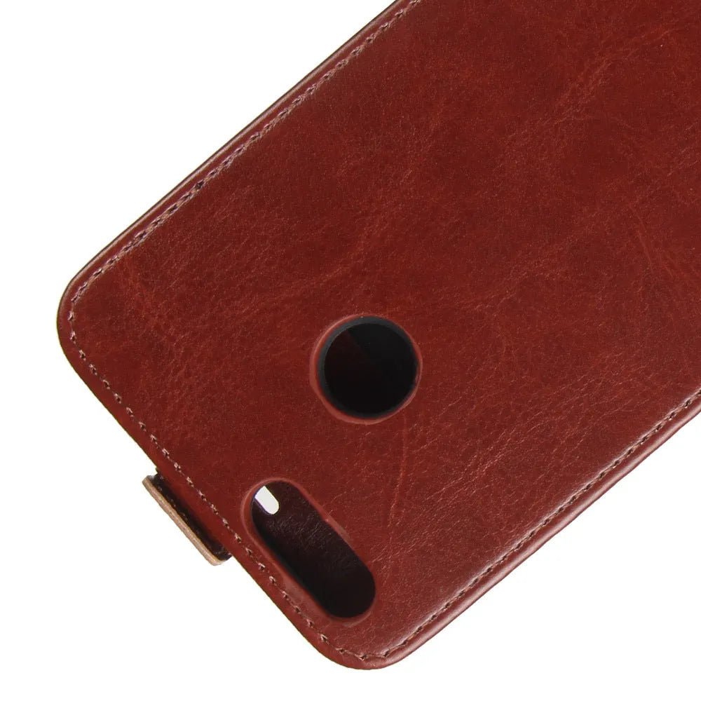 Honor 7X leather wallet phone case in black showing card slots and crazy horse pattern texture.
