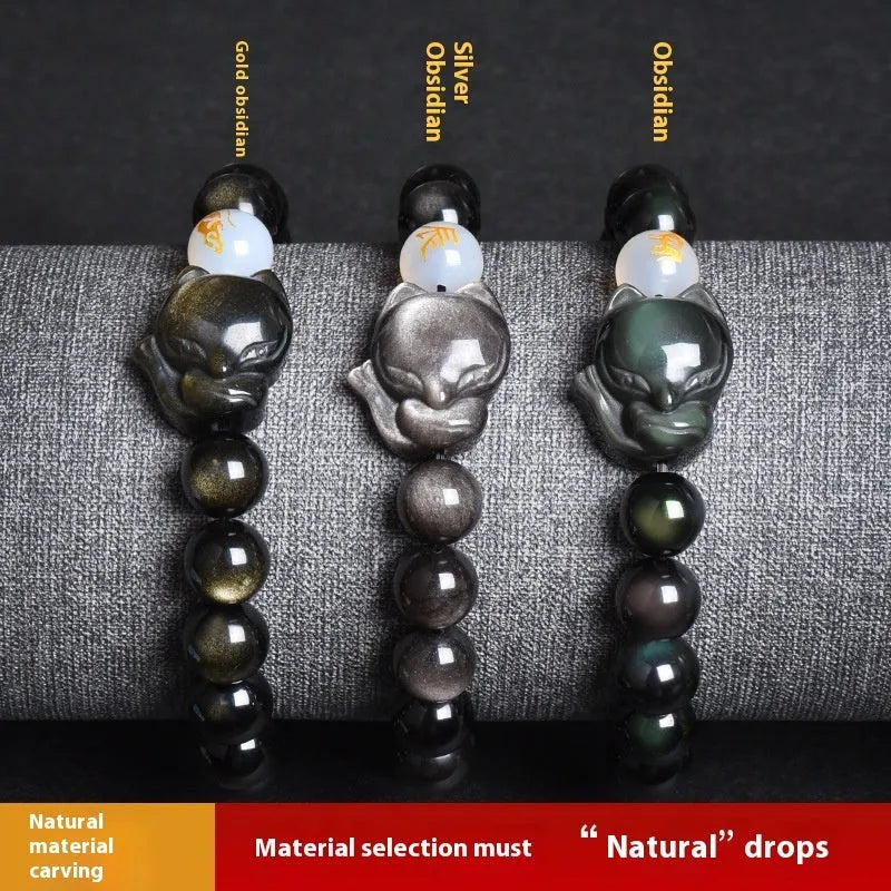 Natural obsidian bracelet with 10mm beads in gold, silver, or black finish.