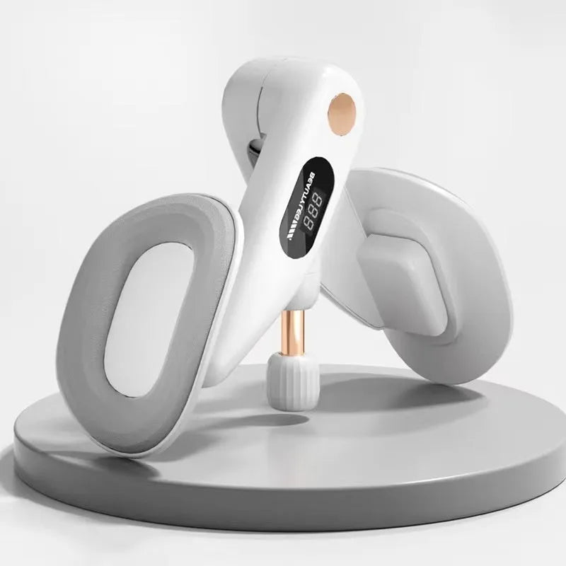 Electronic counting pelvic floor muscle trainer device in grey ABS and foam construction