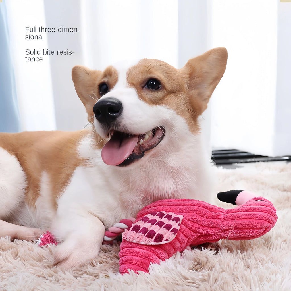 Pink animal-shaped corduroy dog toy with a squeaker inside on a white background.