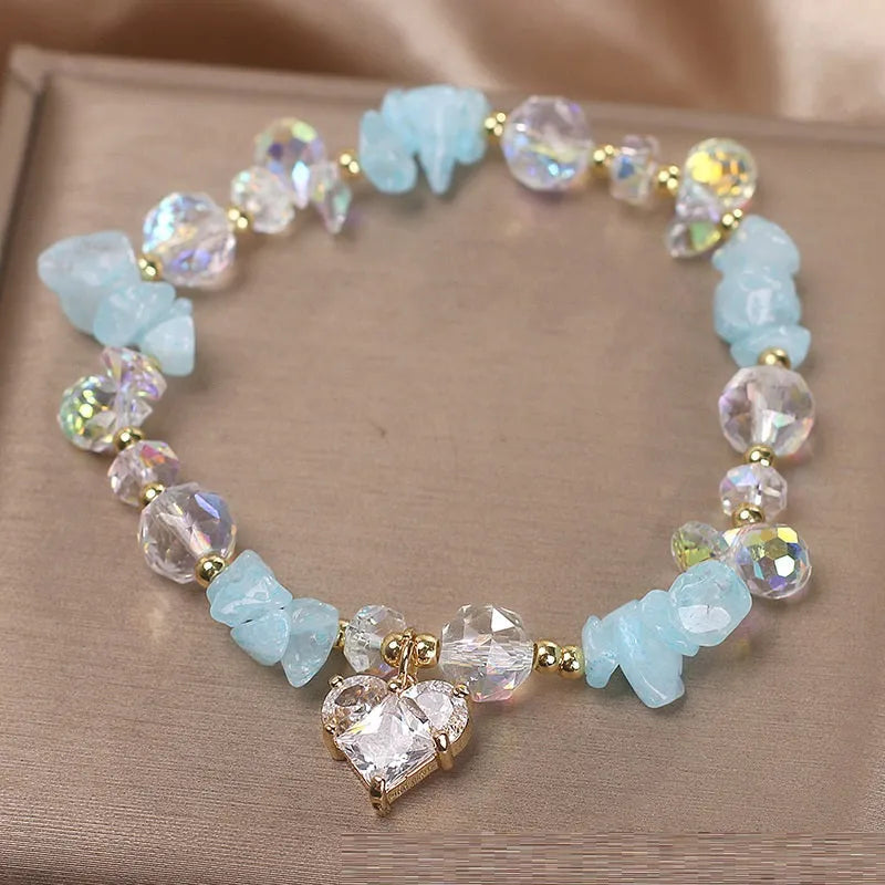 Sky blue aquamarine gravel crystal bracelet for women with heart detail and electroplated finish