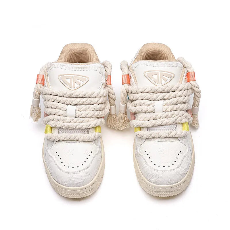 Creamy white retro skateboard shoes with lace-up front and platform sole