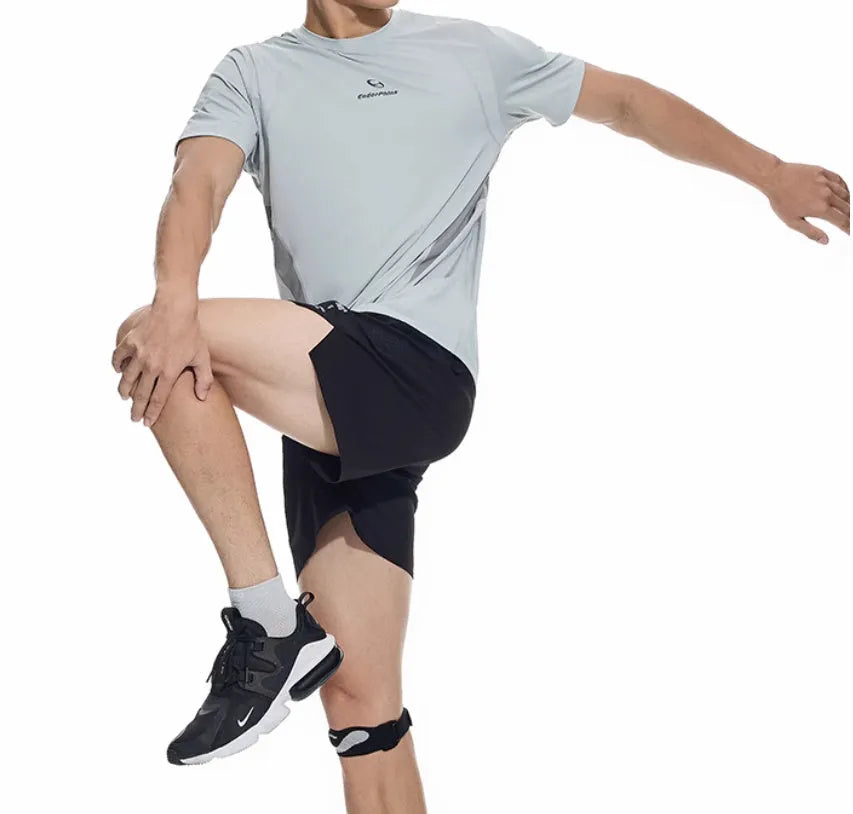 Men's black four-point stretch running shorts with laser-stitched seams on a grey background.