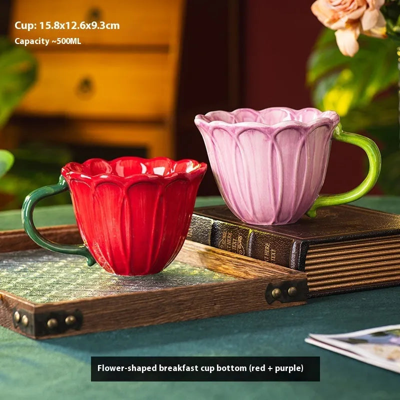 Ceramic breakfast cup with floral pastoral design showing red and purple colour options