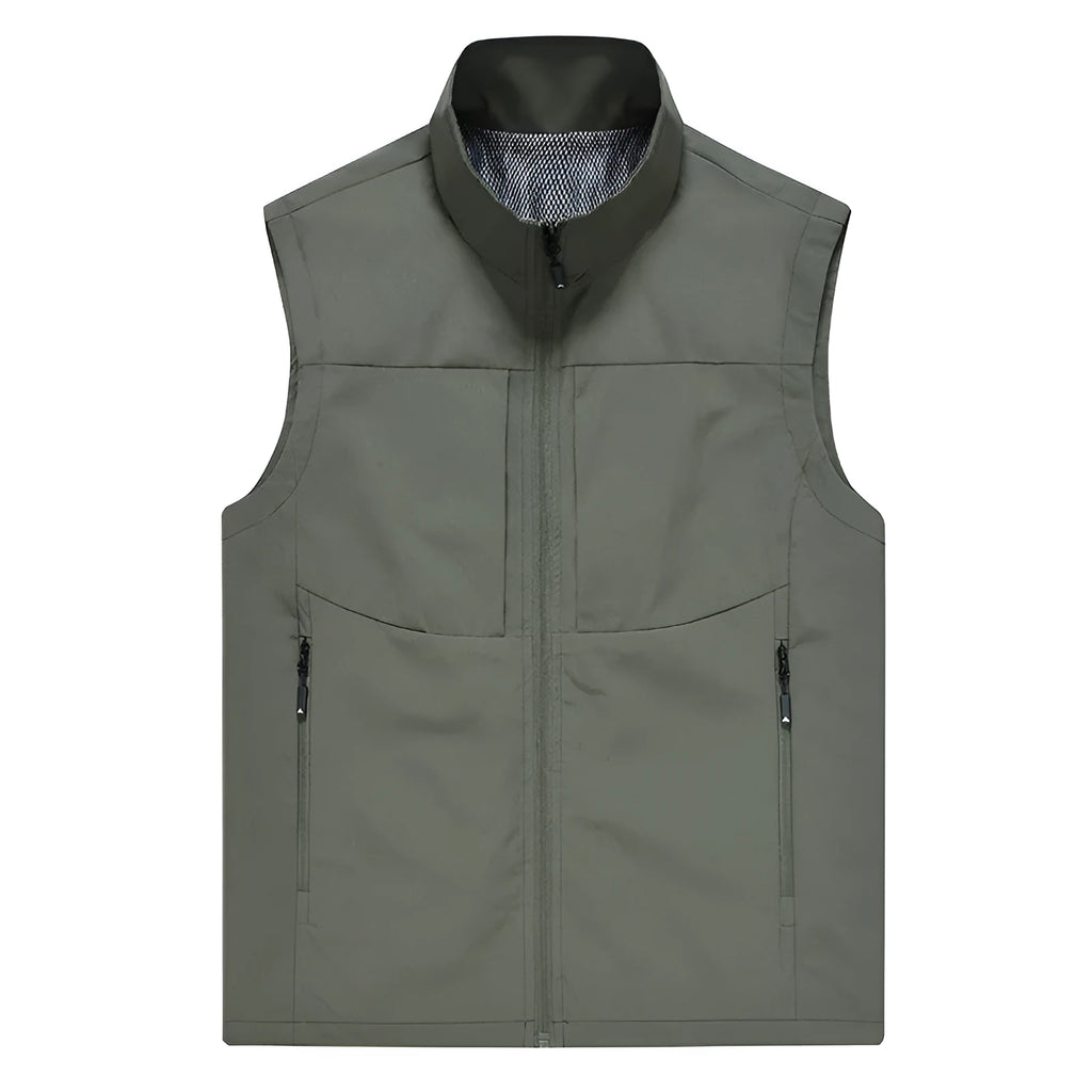 Man wearing a khaki stand collar cardigan vest with zipper pockets outdoors.