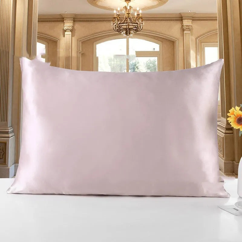 19 M double-sided silk pillowcase shown in apricot colour, lying flat to show envelope closure.