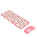 Black wireless keyboard and mouse set with compact 96-key layout and USB receiver on a wooden desk.