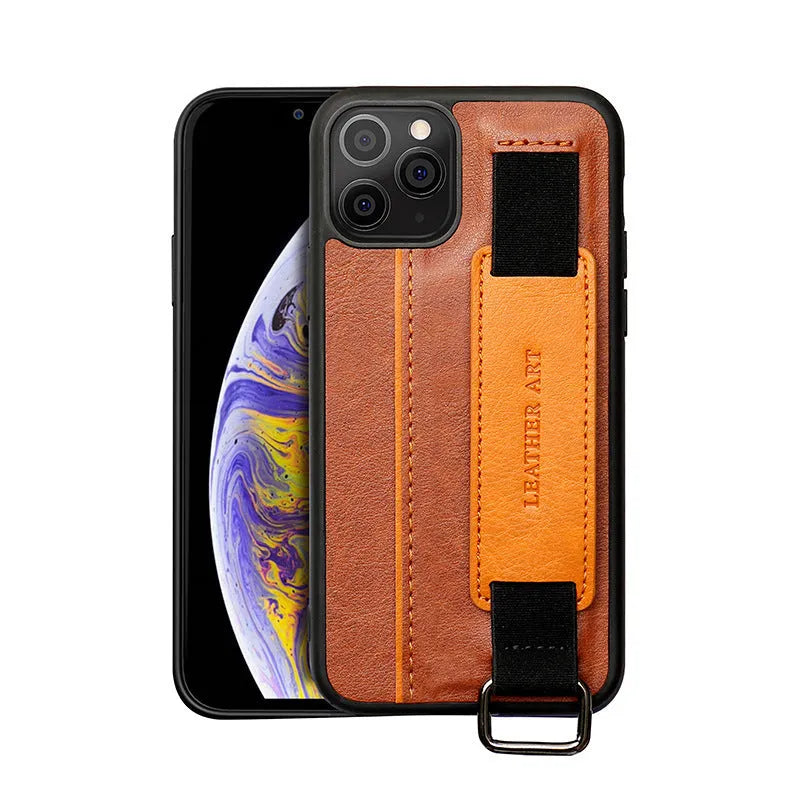 Brown imitation leather iPhone wallet case with a built-in adjustable wrist strap, shown fitted to a phone.