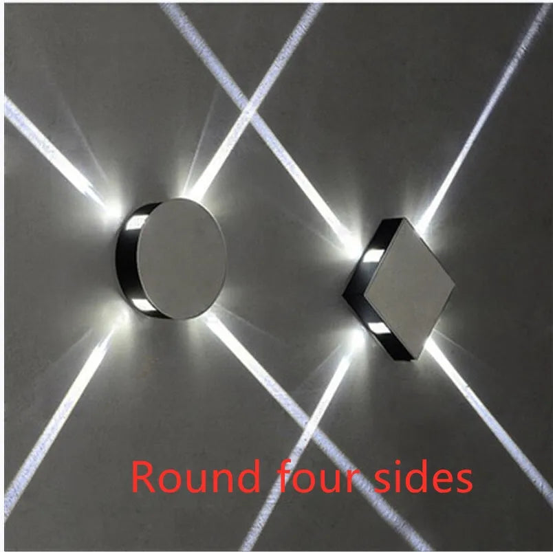 Modern square or round LED aluminium wall light with iron shade showing warm white illumination
