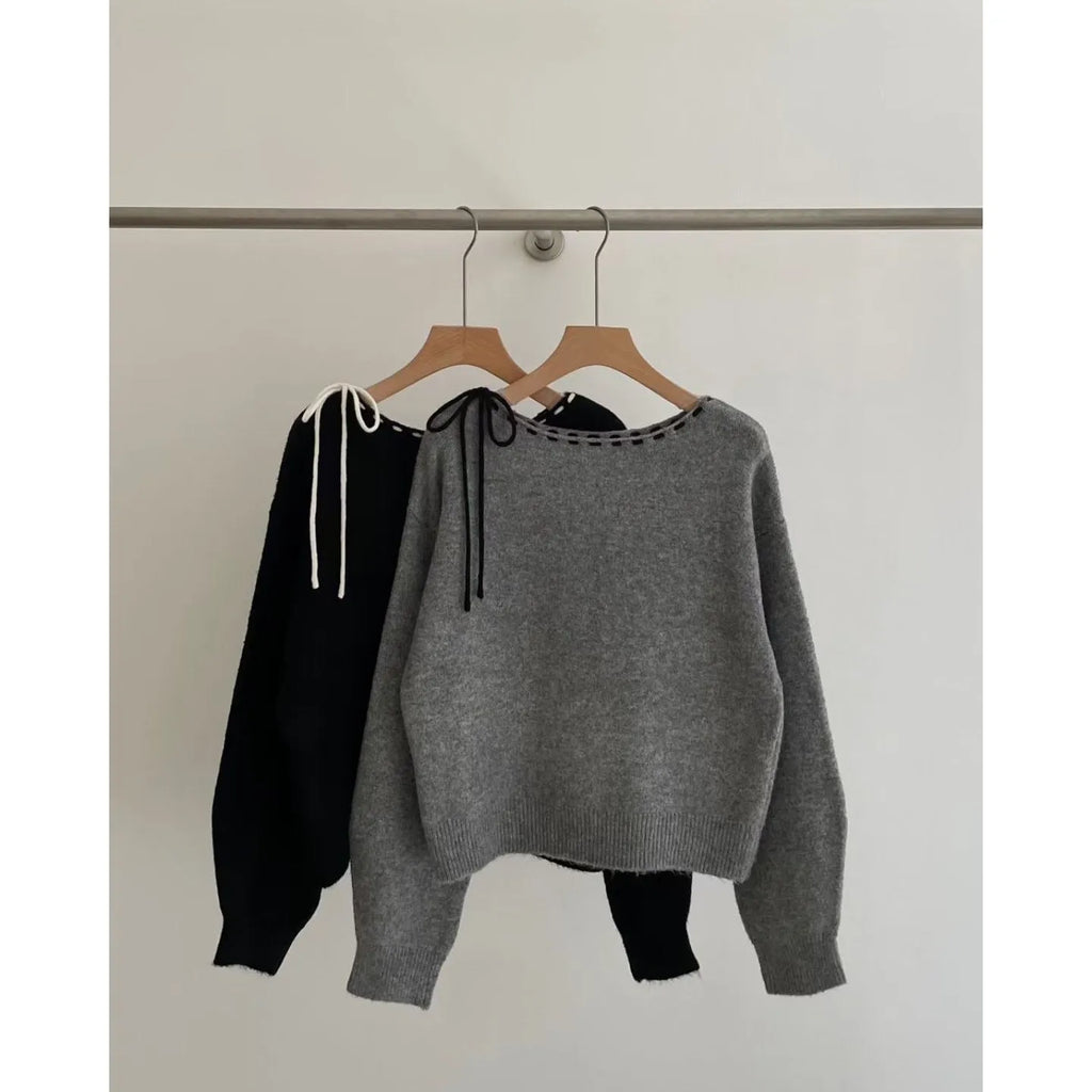 Women's loose-fit knit pullover sweater in black or grey colour with long sleeves