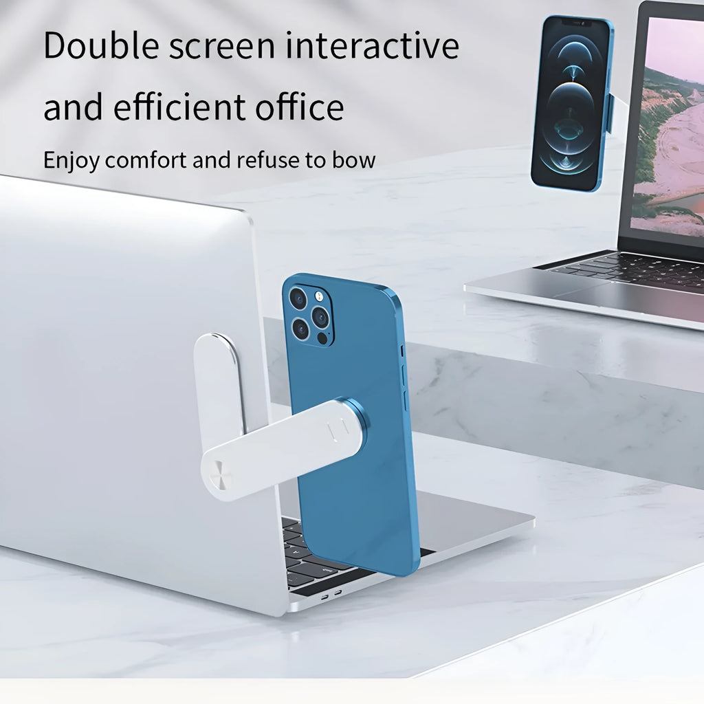 Black aluminium magnetic phone holder clipped to the side of a silver laptop.