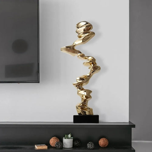 Abstract still life decorative sculpture in natural resin with metallic finish