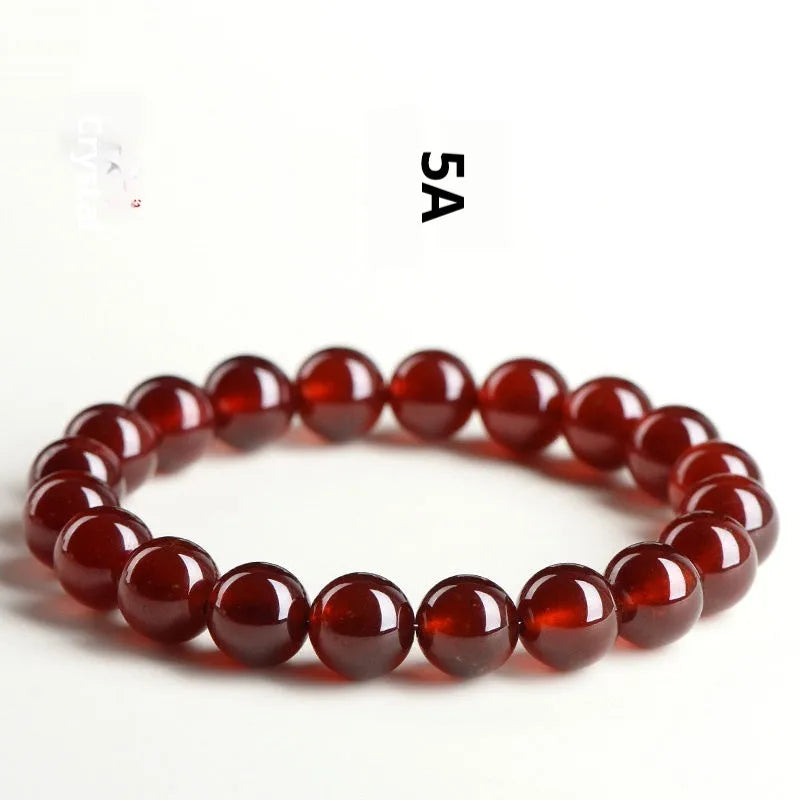 Natural orange red garnet ball bracelet with Ruyi style beads in 5A and 7A grades