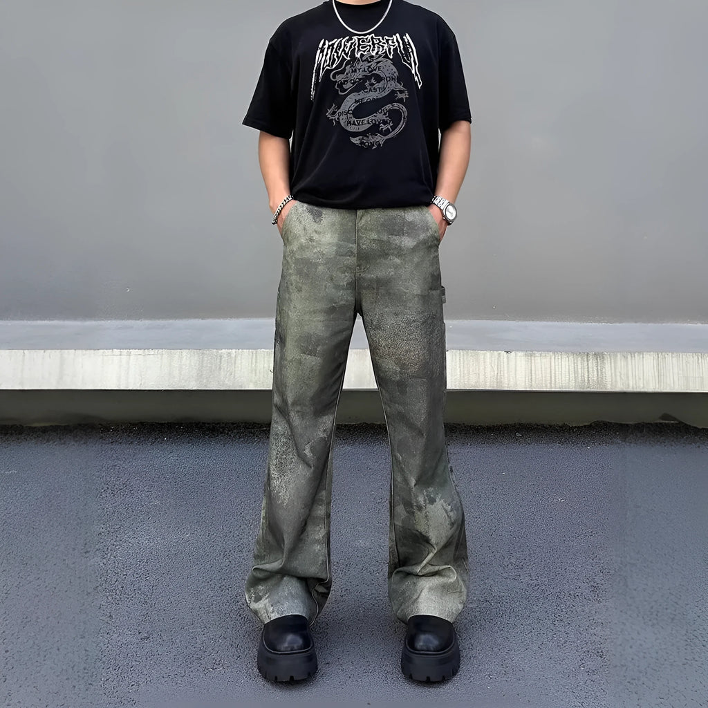 Men's straight-leg jeans with a digital camouflage print on blue denim fabric.