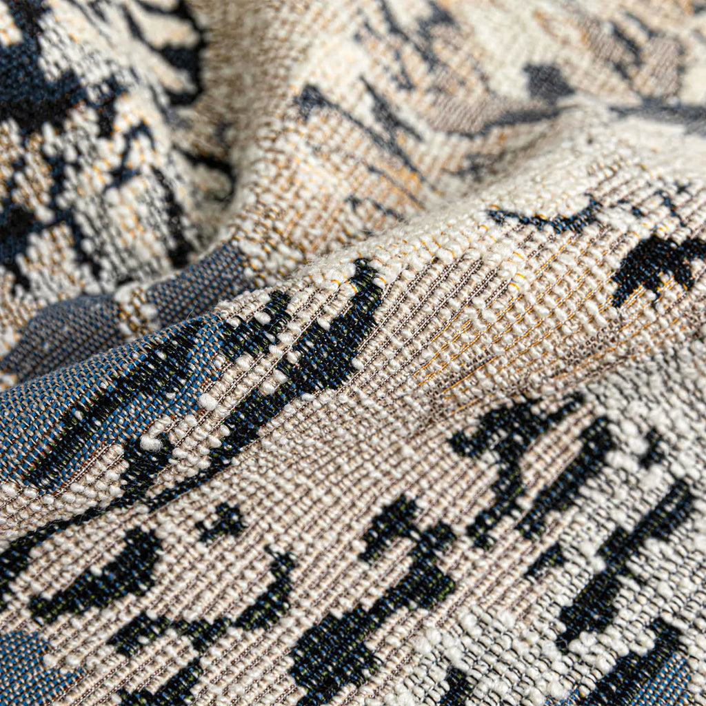Antique blue decorative cushion with abstract floral pattern, shown in square and waist pillow sizes.