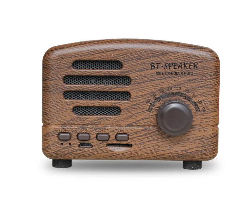 Vintage wood Bluetooth speaker in black, pink and wood grain colours showing compact design