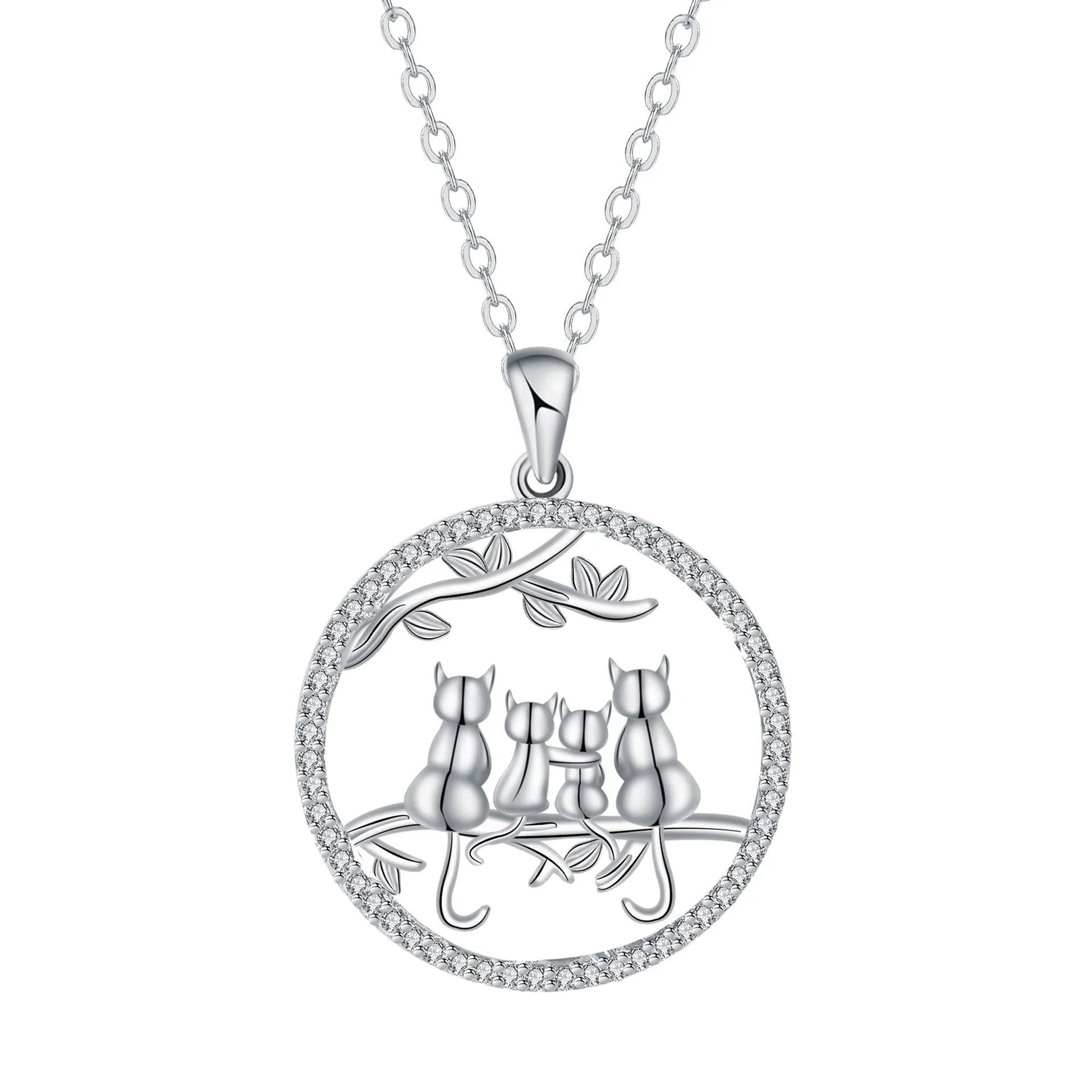 Women's copper necklace with an electroplated pendant showing four kittens on a cross chain.