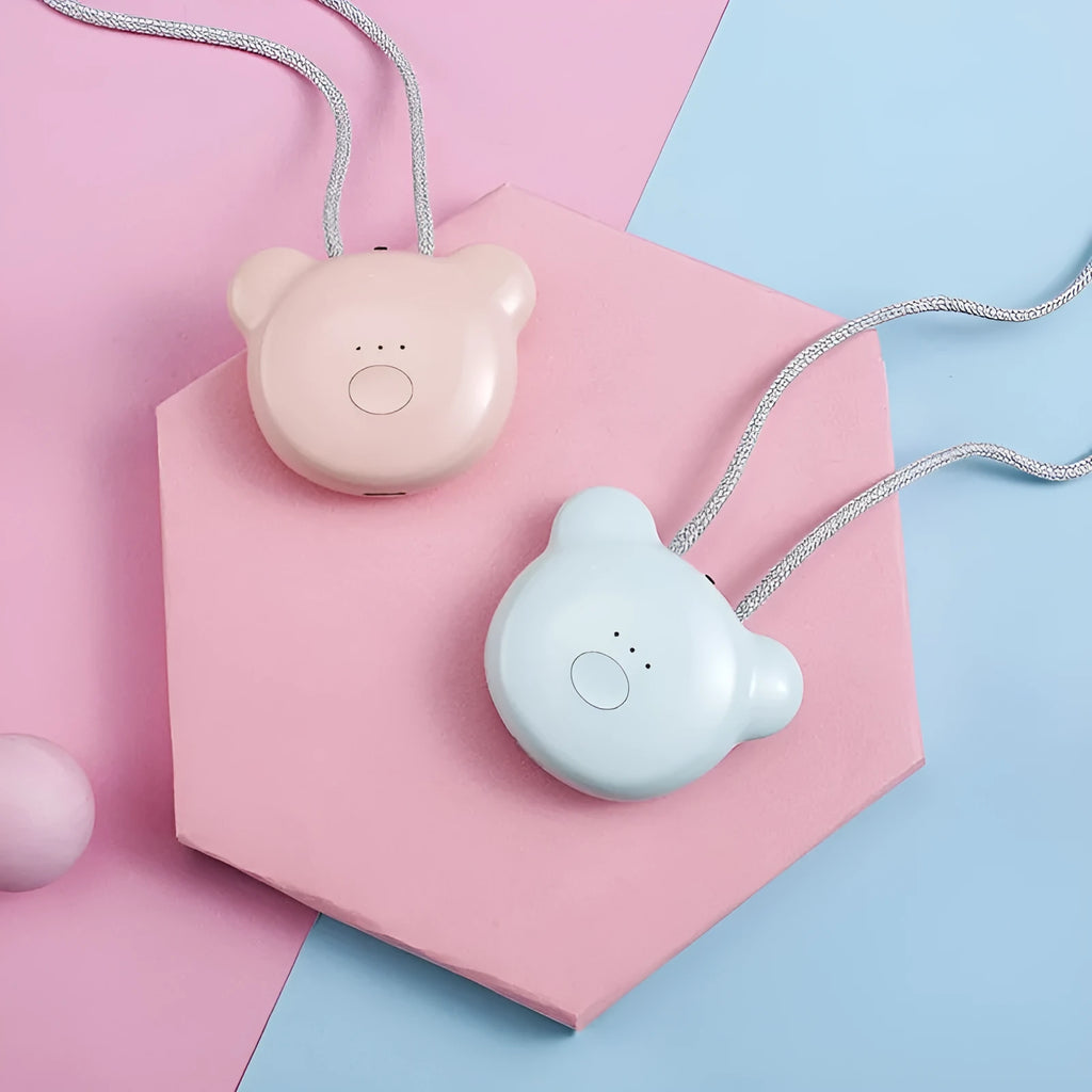 Mini USB air purifier necklace in pink, showing compact dimensions and wearable design.