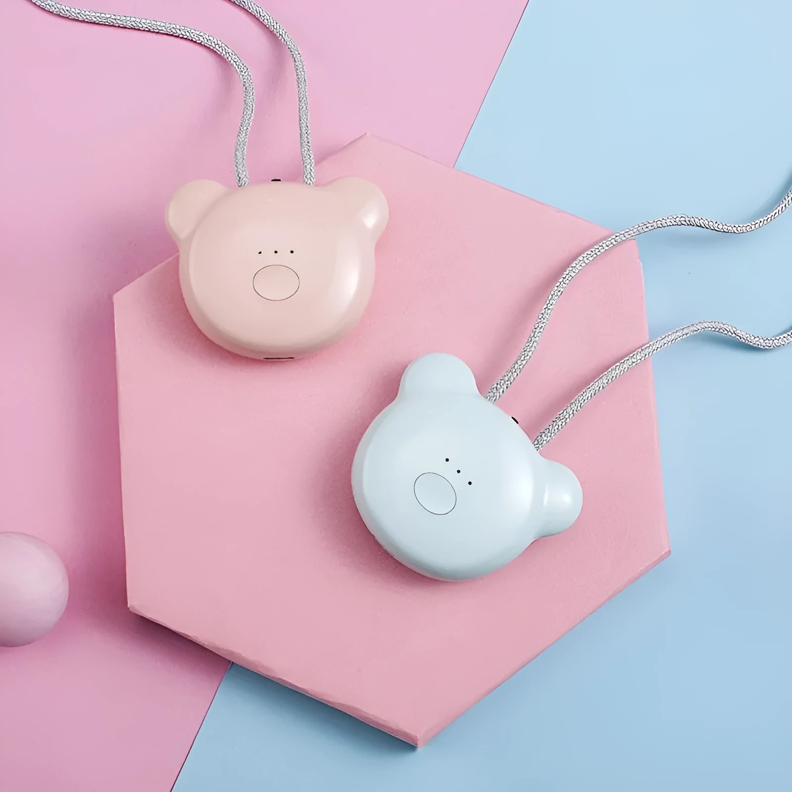 Mini USB air purifier necklace in pink, showing compact dimensions and wearable design.