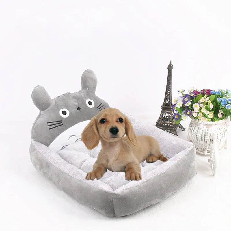Cartoon-style washable pet sofa bed for small dogs and cats in a blue colour.