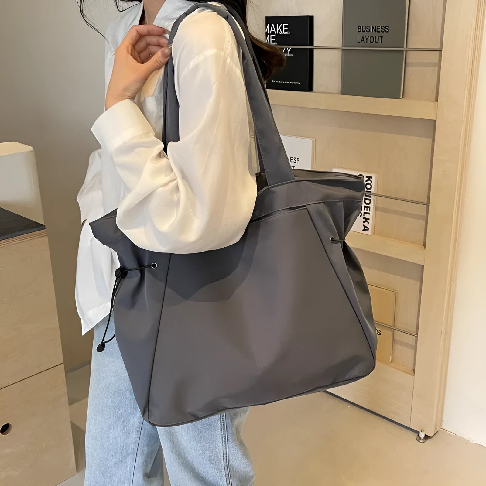 Soft folding Oxford cloth tote bag with shoulder handle in multiple colour options.