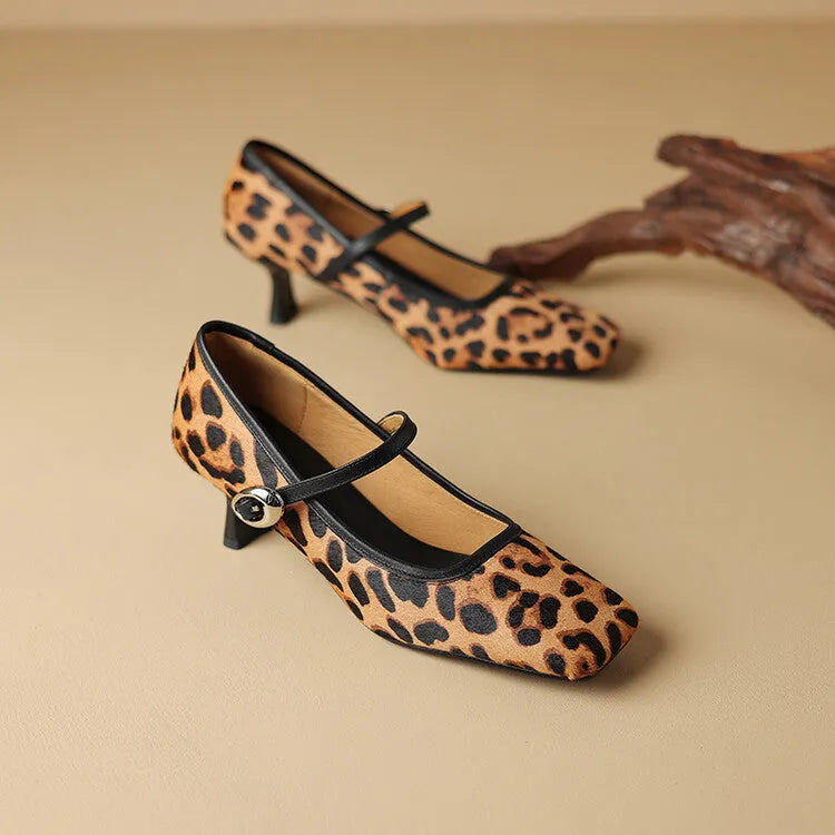 Women's black square toe stiletto ankle-strap heels with horse hair upper and buckle closure.