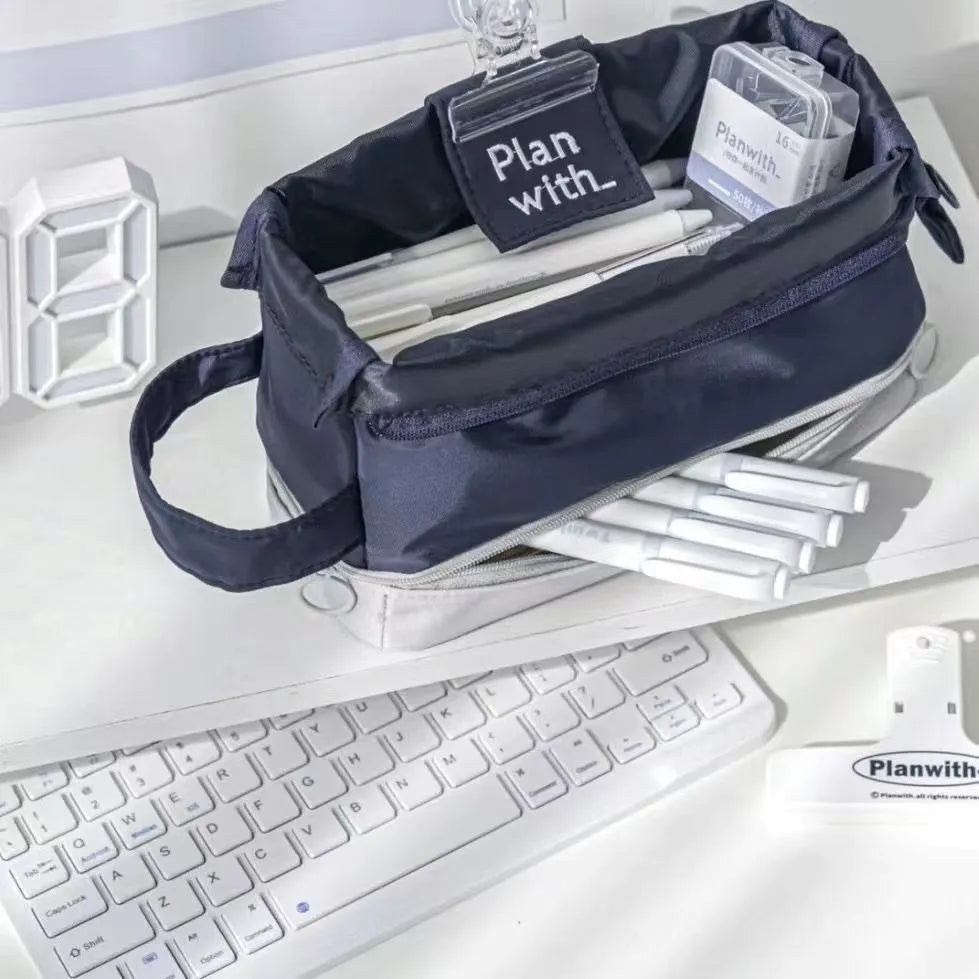 Folding double layer polyester pencil case in dark blue, blue, or cream white with compartment design for stationery organisation.