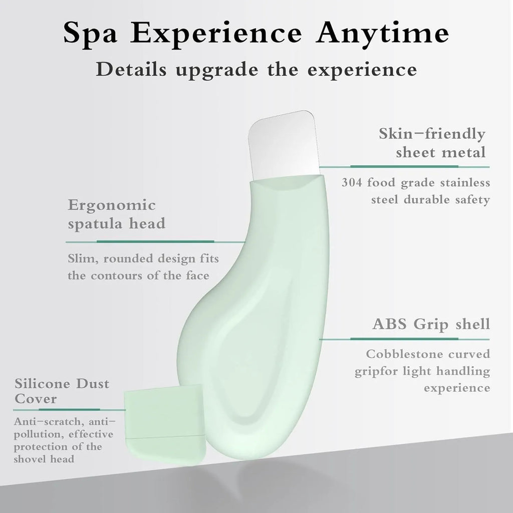 Green silicone-tipped stainless steel facial pore scraper tool with a non-slip handle.