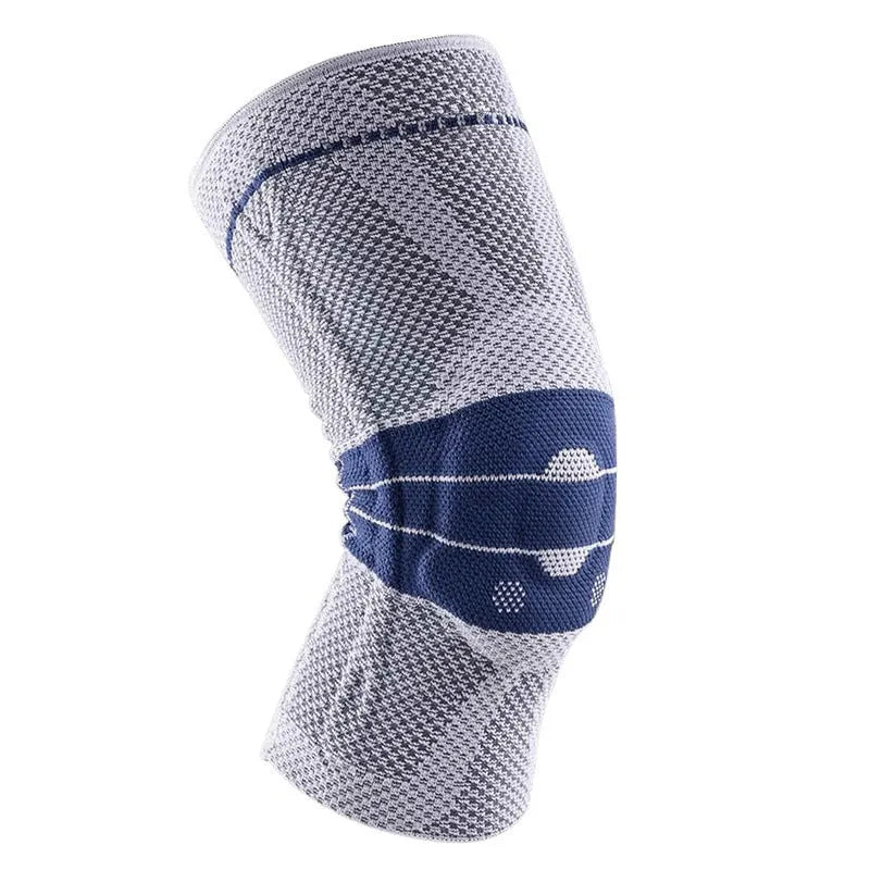 Adult black and blue sports knee pads made from nylon and spandex, shown on a knee.