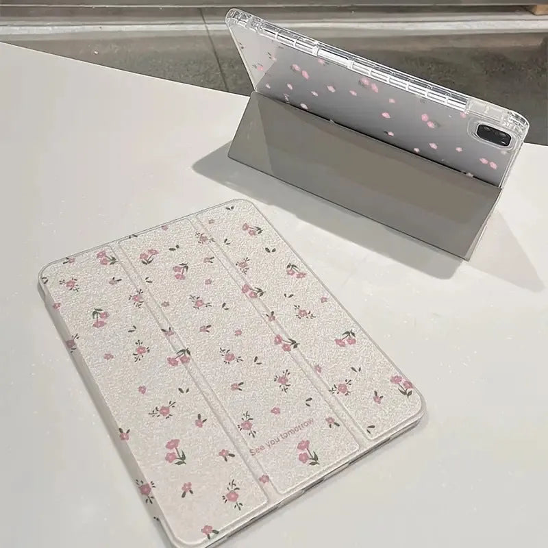 Transparent tri-fold iPad case with floral pattern showing built-in stand angle.
