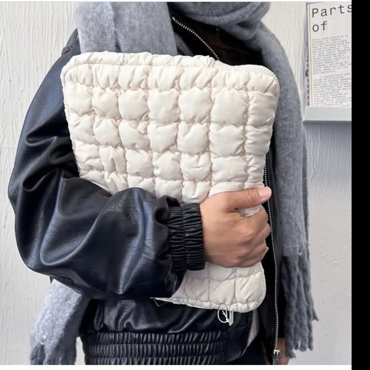 Large black nylon laptop bag open showing interior compartments for 15.6 inch computer