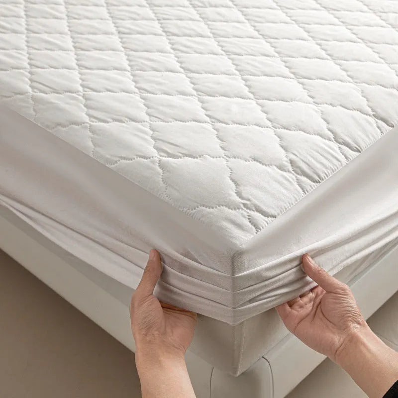 Diamond lattice quilted waterproof mattress protector in bamboo fibre, shown in a solid colour.