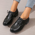 Black women's professional work shoes with chunky heel and pointed toe design